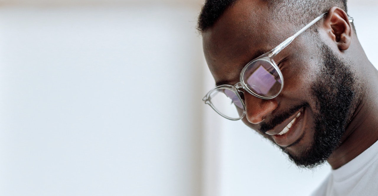 Man wearing blue light glasses